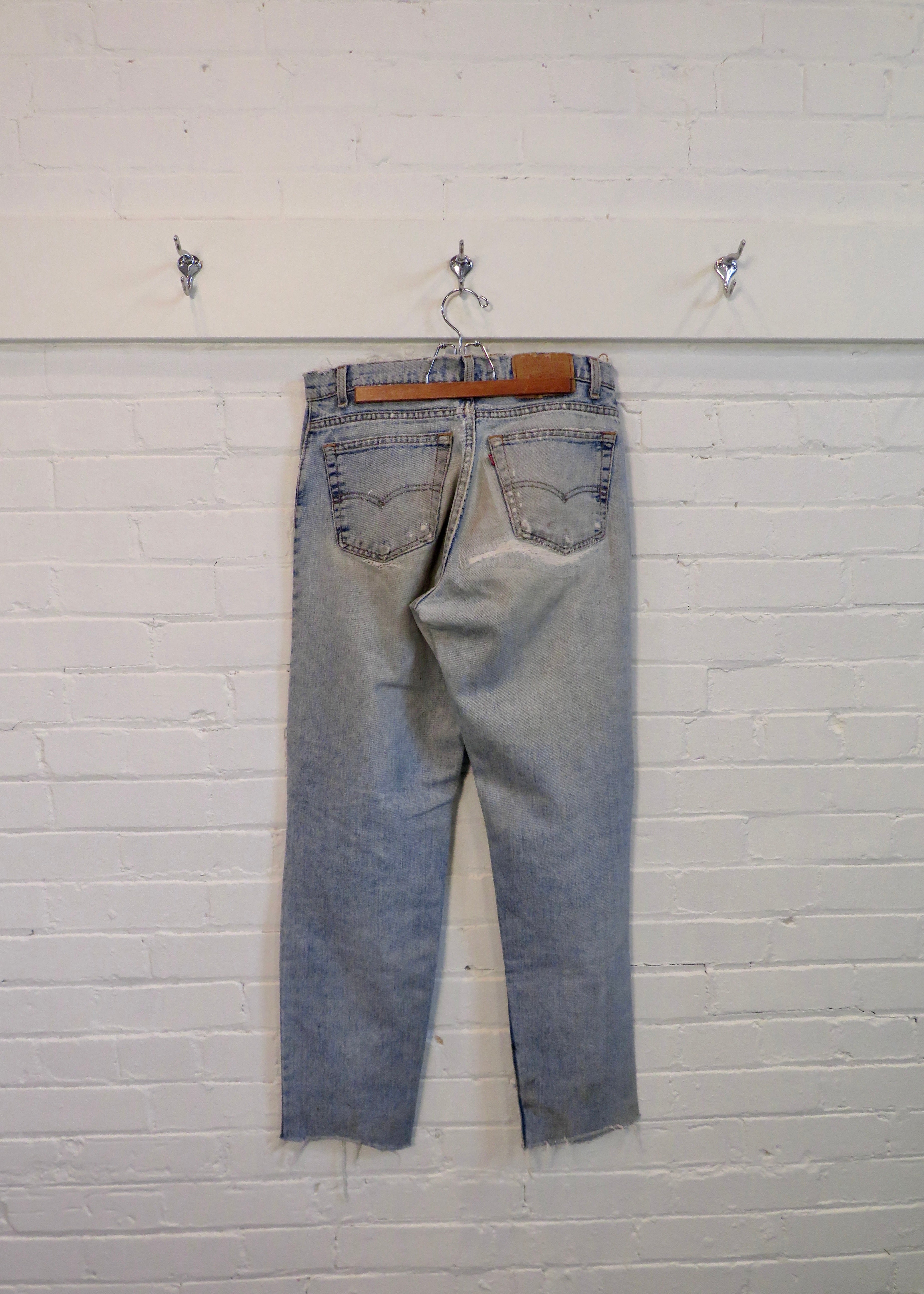 1990s Levi's 550 Repaired Light Wash Jeans