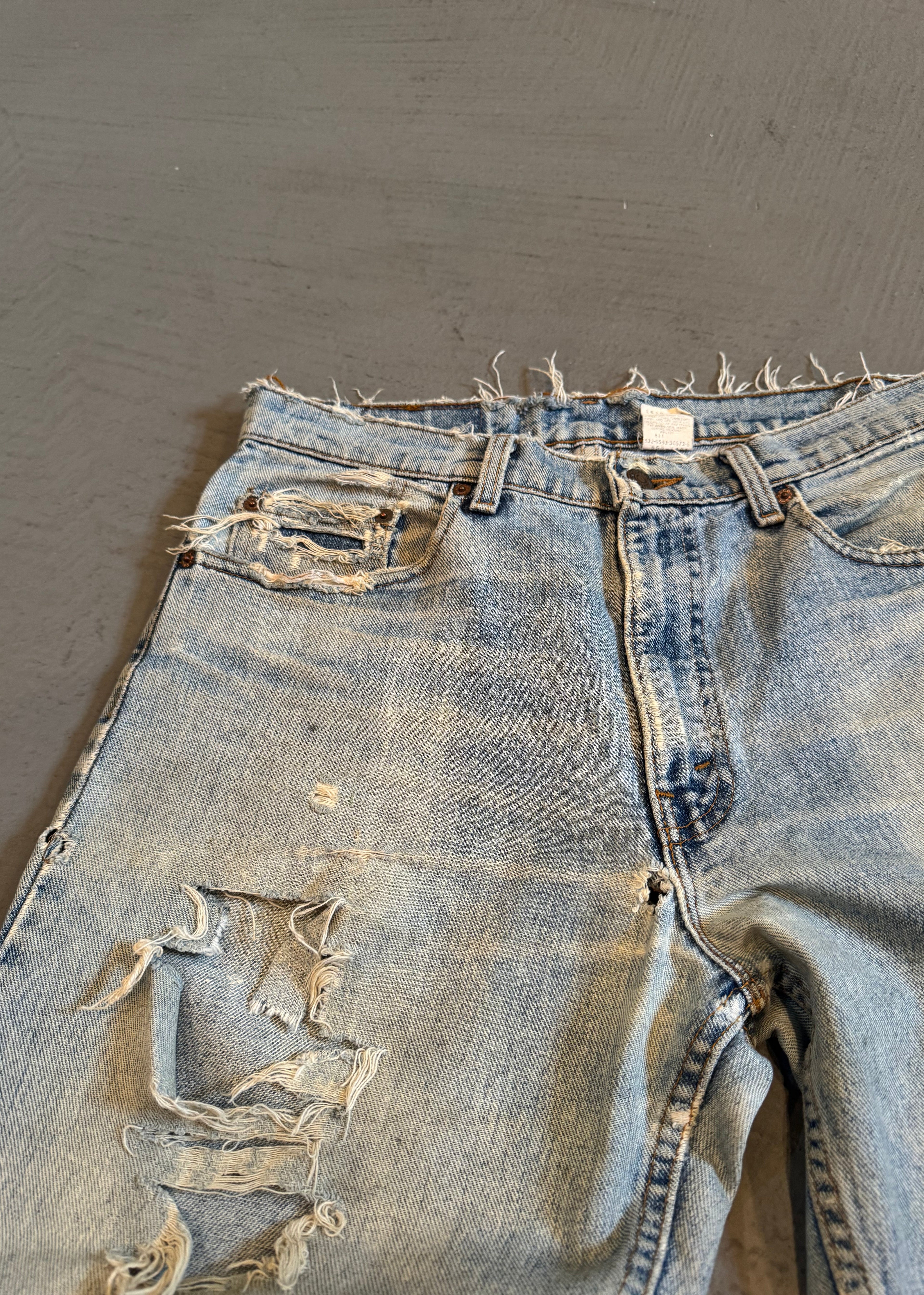 1990s Levi's 550 Repaired Light Wash Jeans