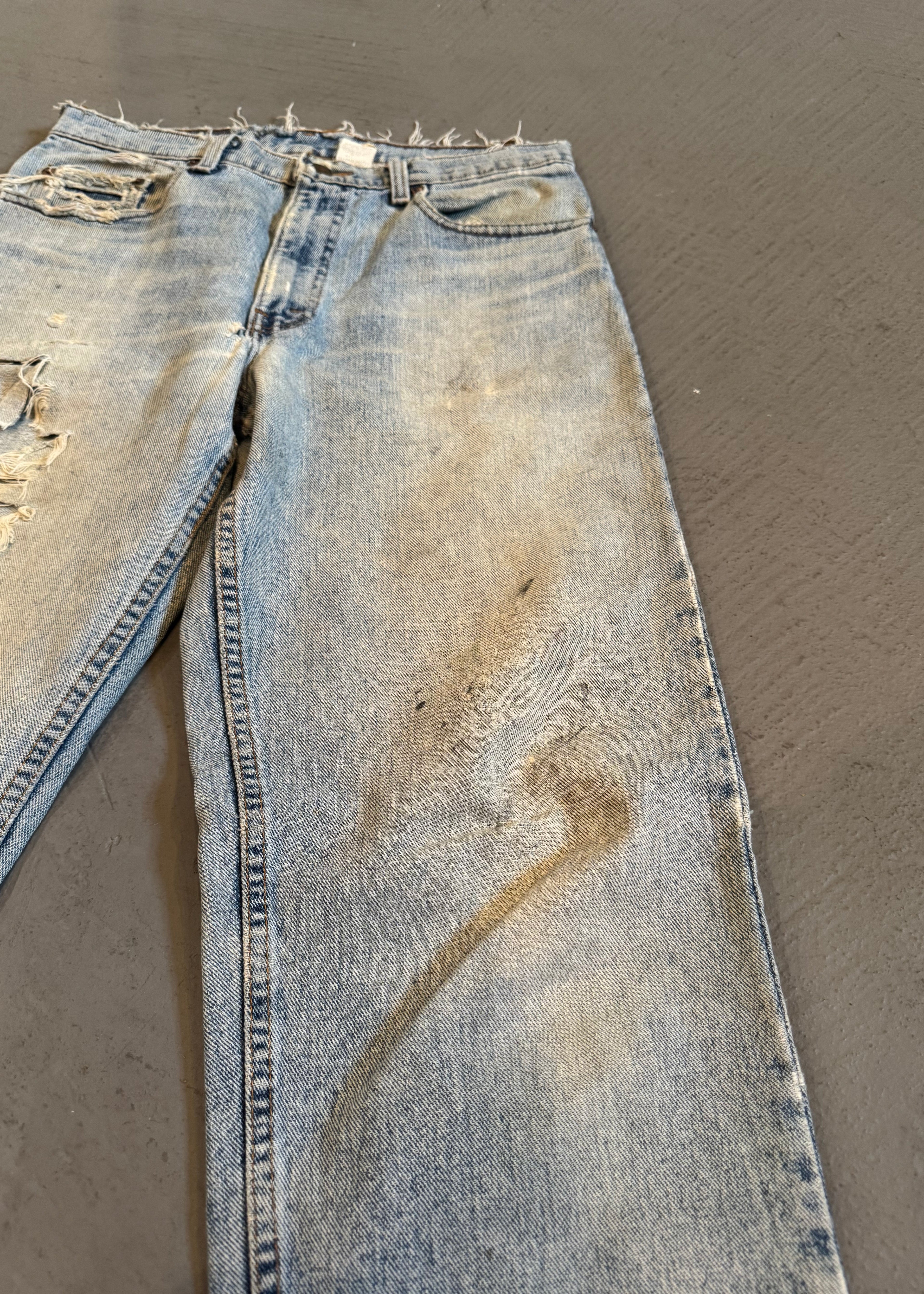 1990s Levi's 550 Repaired Light Wash Jeans
