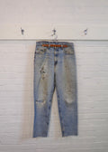1990s Levi's 550 Repaired Light Wash Jeans